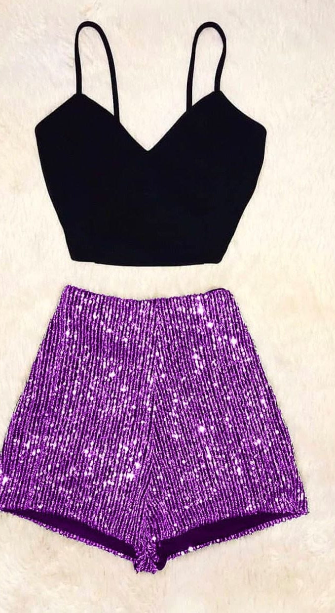 Two-piece dress consisting of a lycra top with fish scale shorts