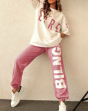 Pajamas of two pieces, cotton Melton, with English letters printed on the T-shirt and on one side of the pants