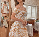 Floral cotton off-shoulder dress