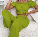 Two-piece pajama made of ribbed cotton, elasticated from under the chest and shoulders